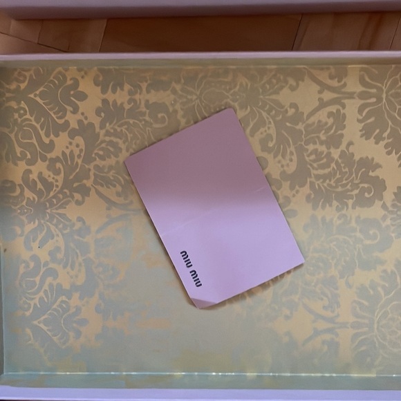 Miu Miu
Beige & Grey Embossed Leather Platform Heel - Picture 11 of 13